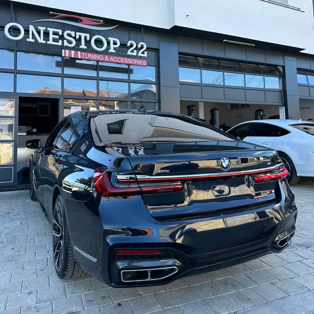 BMW G11 with G12 Facelift style rear bumper diffuser and tail lamps