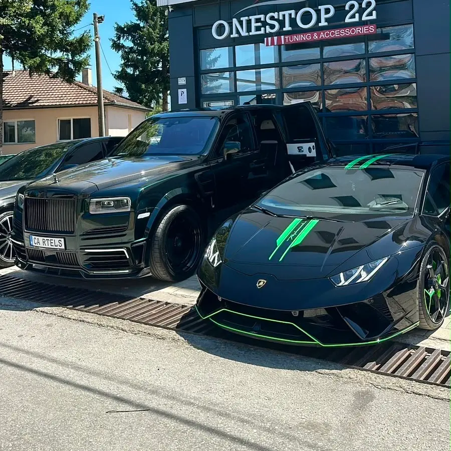 Rolls-Royce Cullinan and Lamborghini Huracan luxury vehicles together
