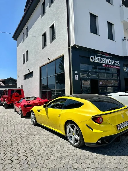 Ferrari FF Ferrari 488 Spider and Mercedes-Benz G-Class luxury vehicles together