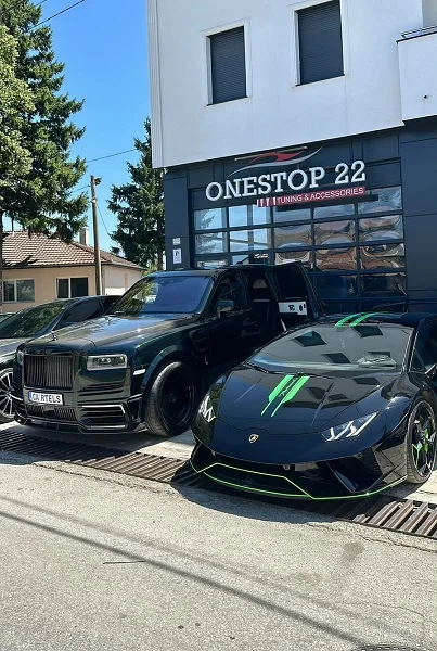 Rolls-Royce Cullinan and Lamborghini Huracan luxury vehicles together